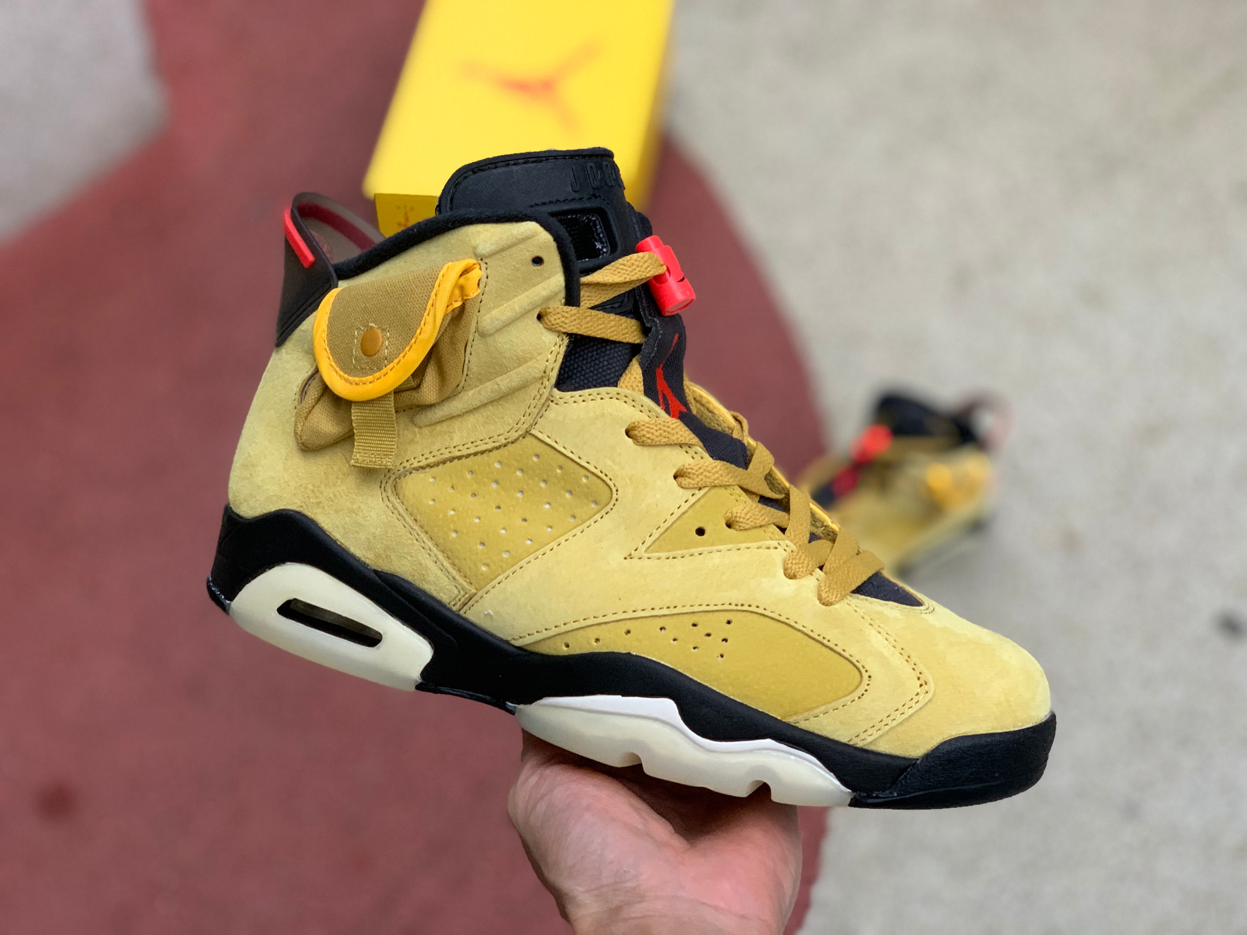 Travis scott jordan 6 on sale yellow